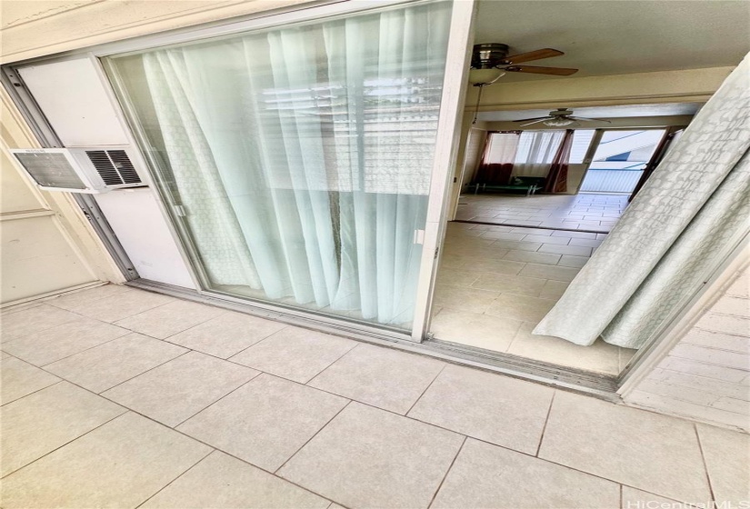 covered lanai next to the bedroom