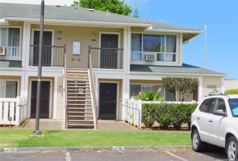 Upstairs, end unit with one assigned covered parking and one assigned uncovered parking