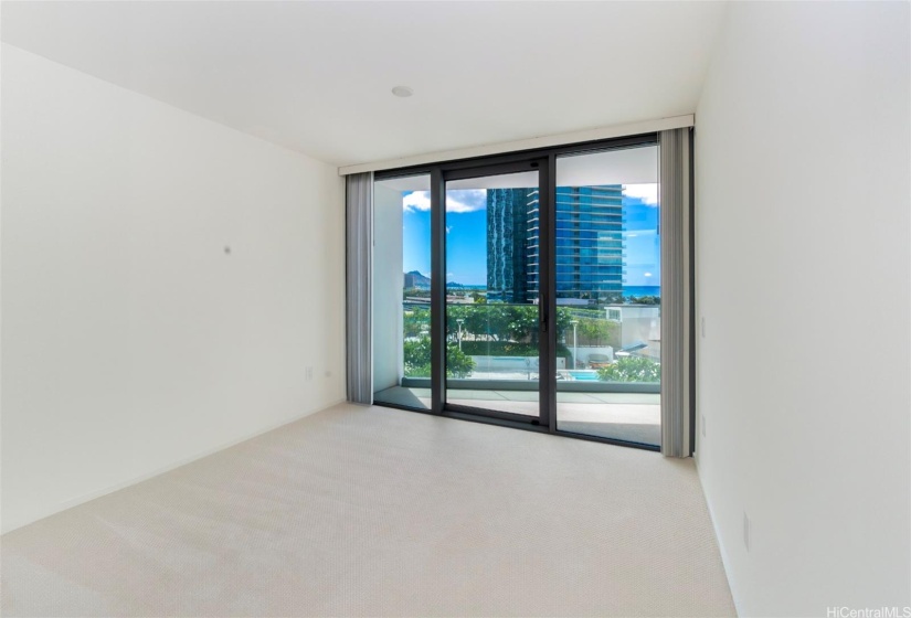 Primary Bedroom overlooking the Pool from the 9th floor