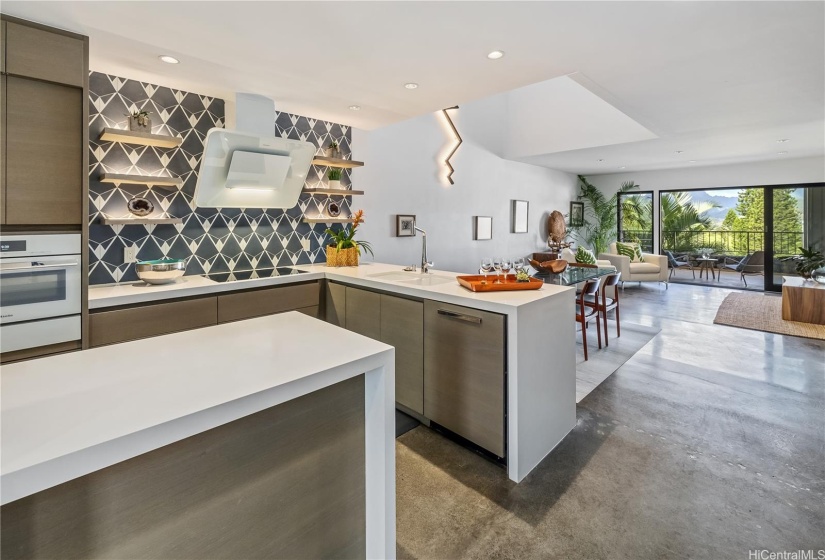 Gourmet kitchen to the left, a large walk-in service pantry on the right.