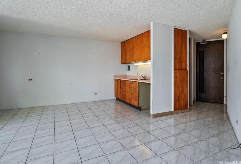 Living room area with tile flooring