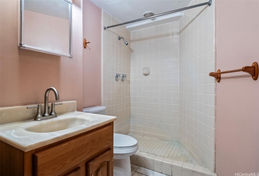 Full bathroom with medicine cabinet