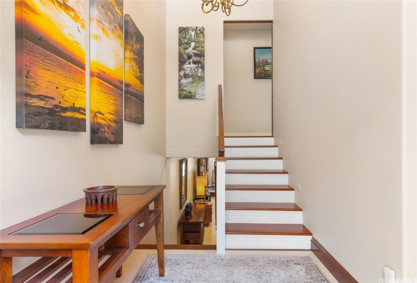 Entry way leading to the living room and 2 bedroom/2bath upstairs.