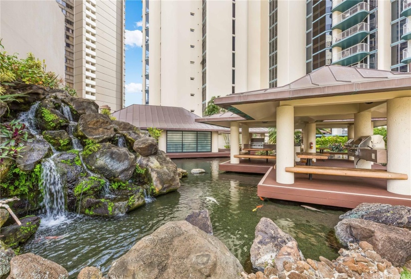 Cabanas, waterfall, koi ponds