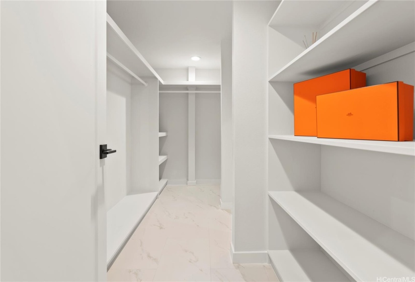 Front residence - primary bedroom's endless closet.