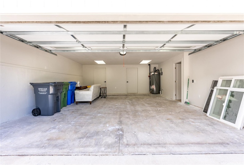 Garage - with two large storage rooms and access to interior of front residence.  Driveway and carport at entrance to rear residence provides additional parking space but street parking is always ample.