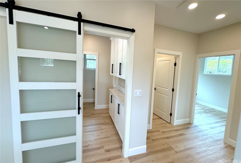 Modern Barn Door to Laundry; 1/2ba(toilet); Back Door