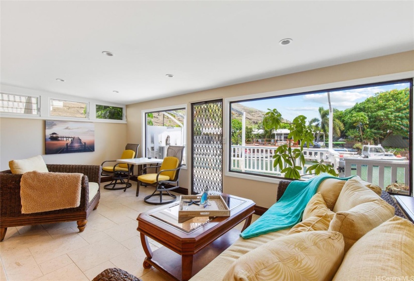 Large living room right next to the deck.