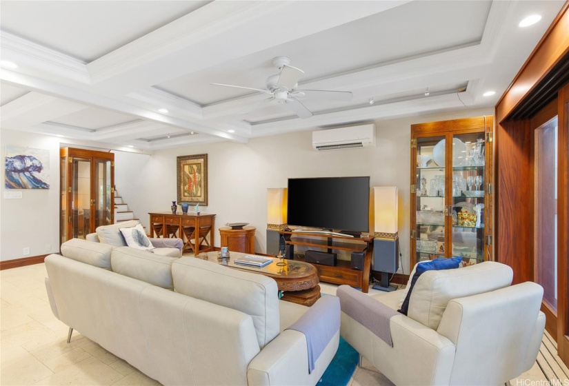 Luxury travertine floors and recessed ceiling with lights all through the house.