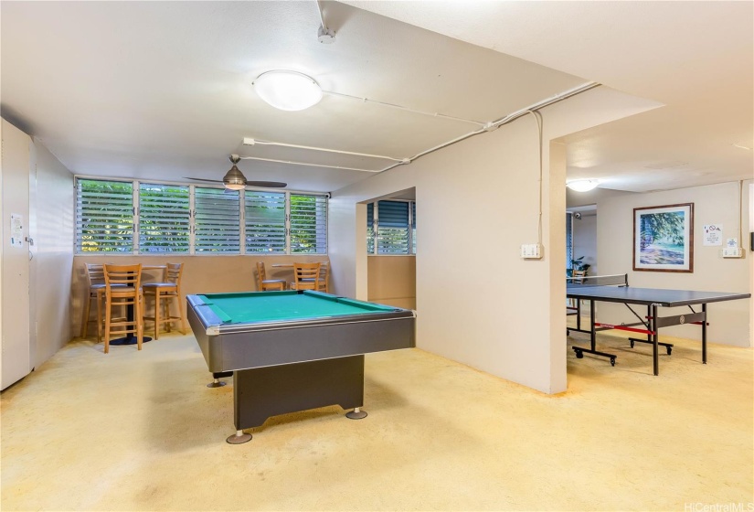 recreation room with pool and ping pong table