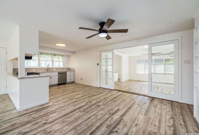 Step-down family room with sliding doors.