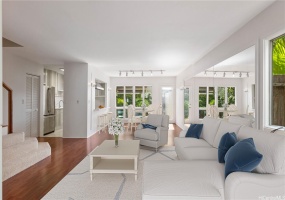 ENHANCED - Spacious and open living area, with mirrored walls, enhances one's sense of space and luxury. Wood laminate flooring on a custom suspended floor, so easy on the feet.