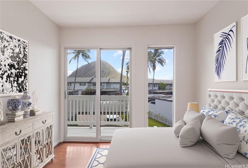 ENHANCED - Bedroom 4, wood laminate floors, lanai, and Koko Head view.