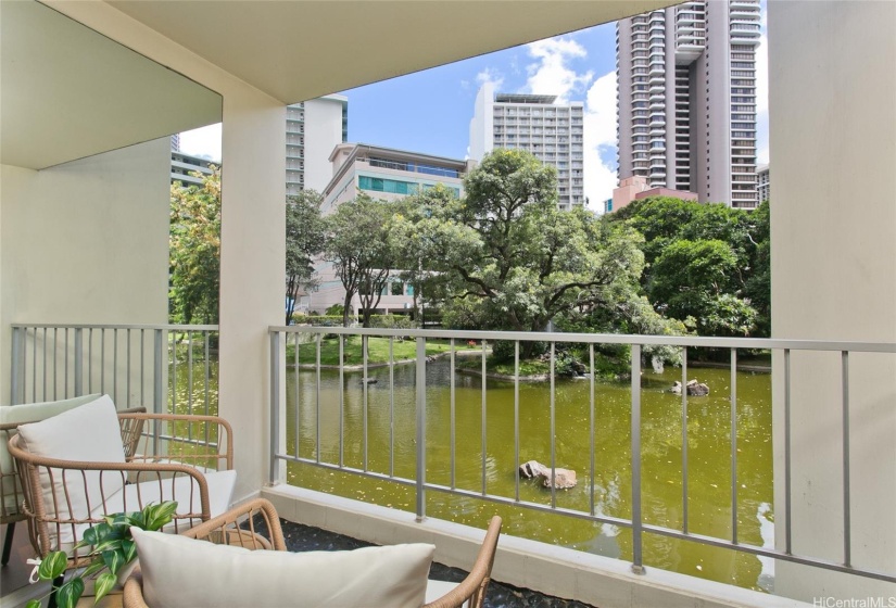 Master suite lanai perfect for morning coffee overlooking pond, landscaping and wildlife.