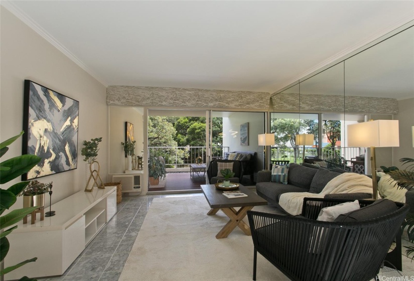 Contemporary living area expanded by full height wall mirrors.