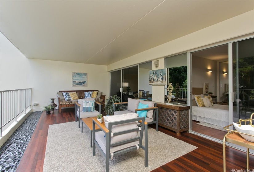 Beautiful calm lanai to relax with entraces off both bedrooms and living room.