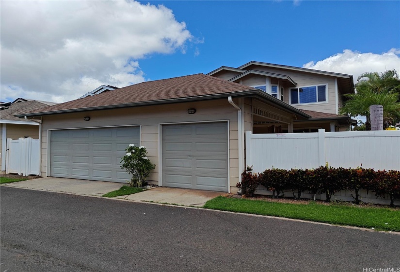 2 Car Garage and carport for a third parking option.