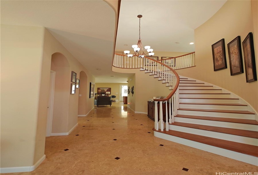 Grand entry with soaring high ceiling.