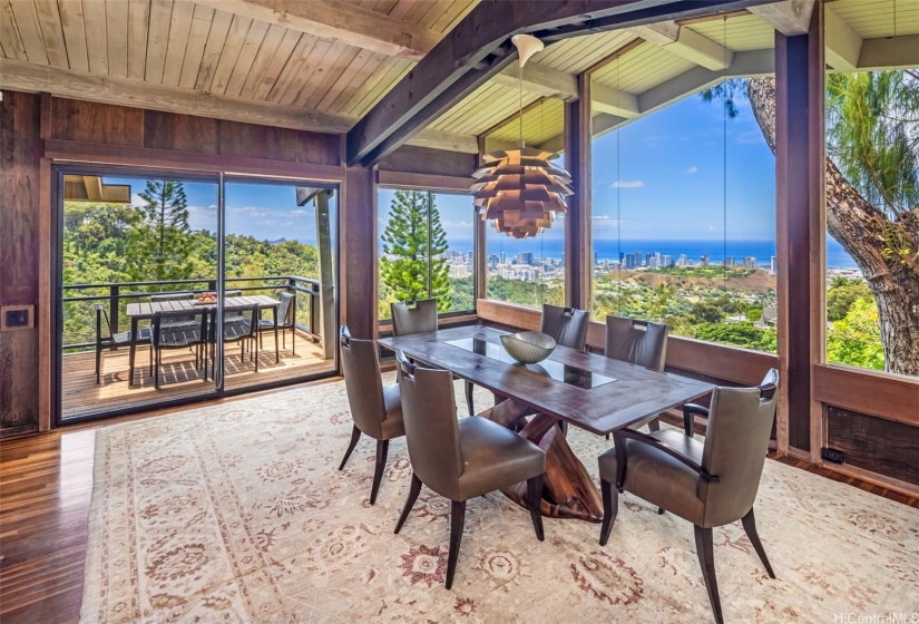 The dining room has unbelievable views on three sides and a lovely deck facing Diamond Head and the ocean.  The elevation is high above the tops of the tallest buildings in Honolulu for clear blue horizons.