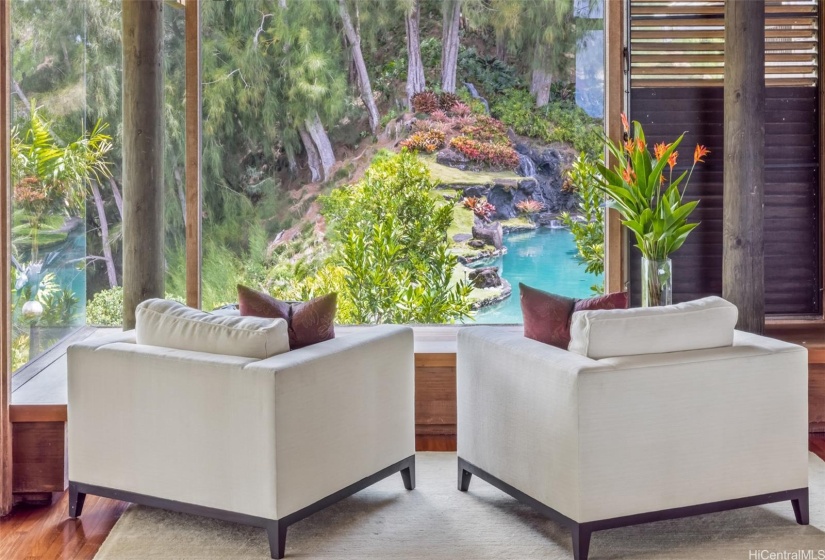 Gaze at your long, lovely pool from the living room.