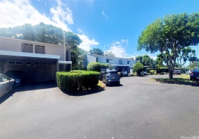 CORNER END, 2 STORY TOWNHOME WITH A CARPORT THAT CAN PARK 2 SMALL CARS. 1 OPEN ASSIGNED PARKING.