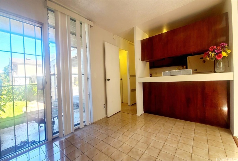 DINING AREA WITH STORAGE UNDER STAIRS