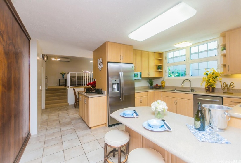 Open kitchen space next to the formal dining room, and additional large den for entertaining.