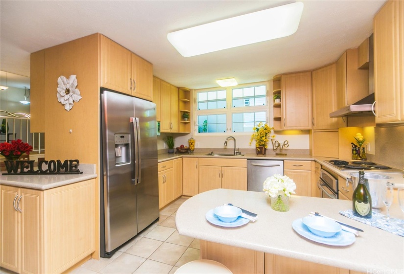 Updated kitchen, all stainless steel appliances and cozy kitchen nook for intimate seating.