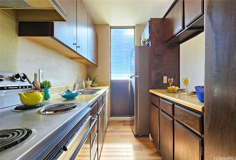 Corner unit, the kitchen has a window for extra ventilation and cross breeze.