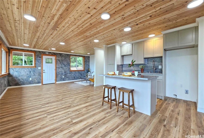 The wooden ceiling provide a warmth and shows the meticulous detail and artistry of the home.