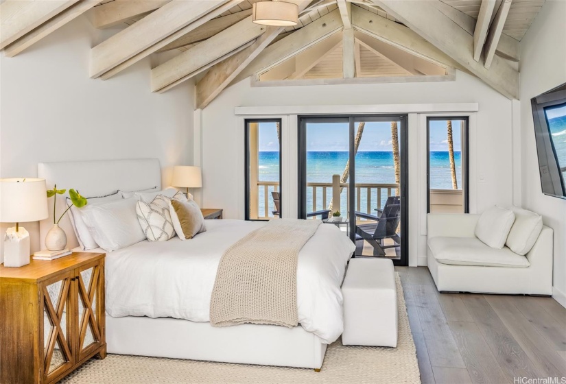 Second floor primary bedroom with ocean views.