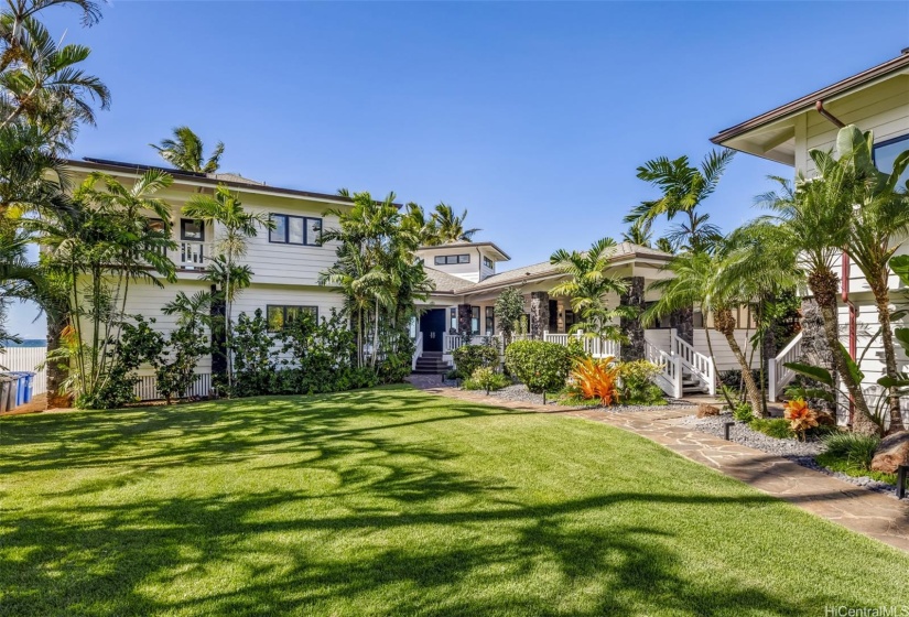 Large yard on the mountain side of the home.