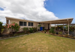 Front of House with carport