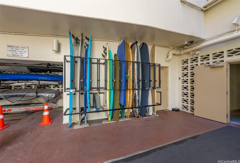 Well thought surfboard rack and SUP area for residents.