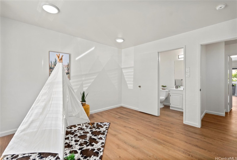 Guest bedroom has attached full bathroom