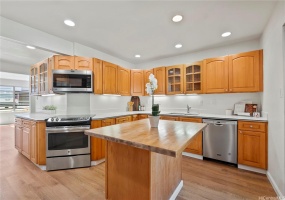 Reconfigured kitchen utilizes the space to make it feel more spacious