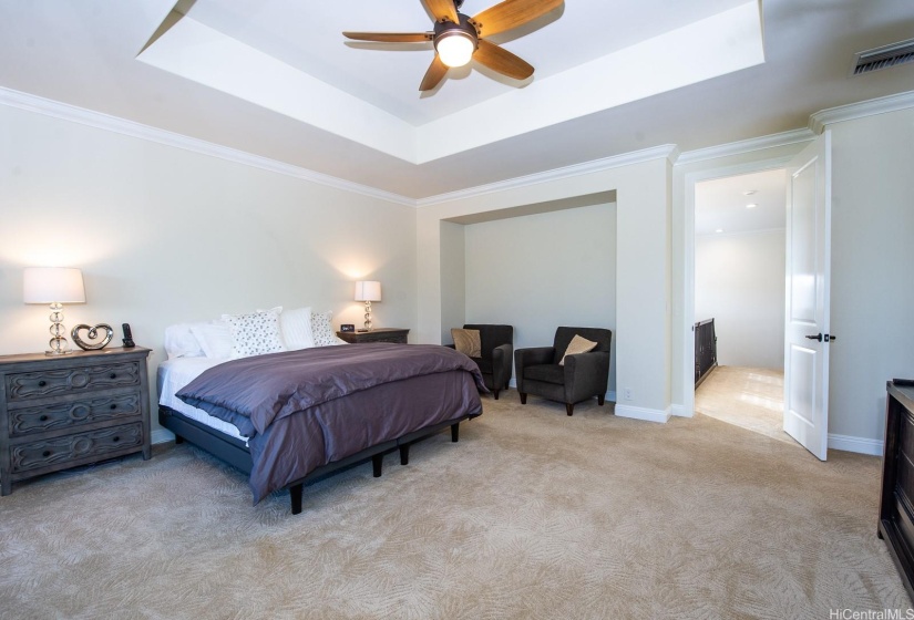 Large primary bedroom can accommodate king sized furniture and a sofa retreat if you like.