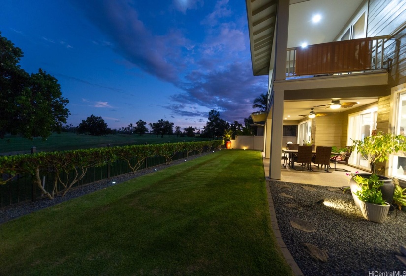 Evening picture of the exterior back. Beautiful sunset skies.