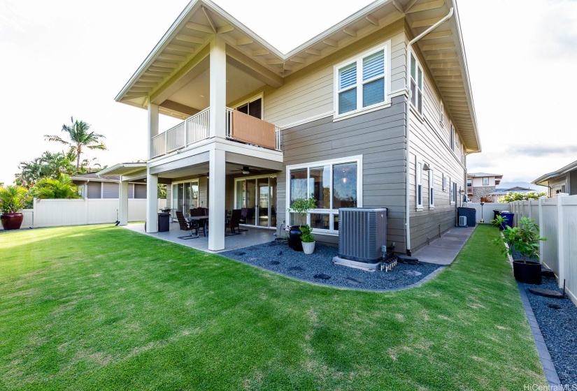 Back of the house. Exterior of the home was  newly painted. Lanai and garage has new concrete coating.