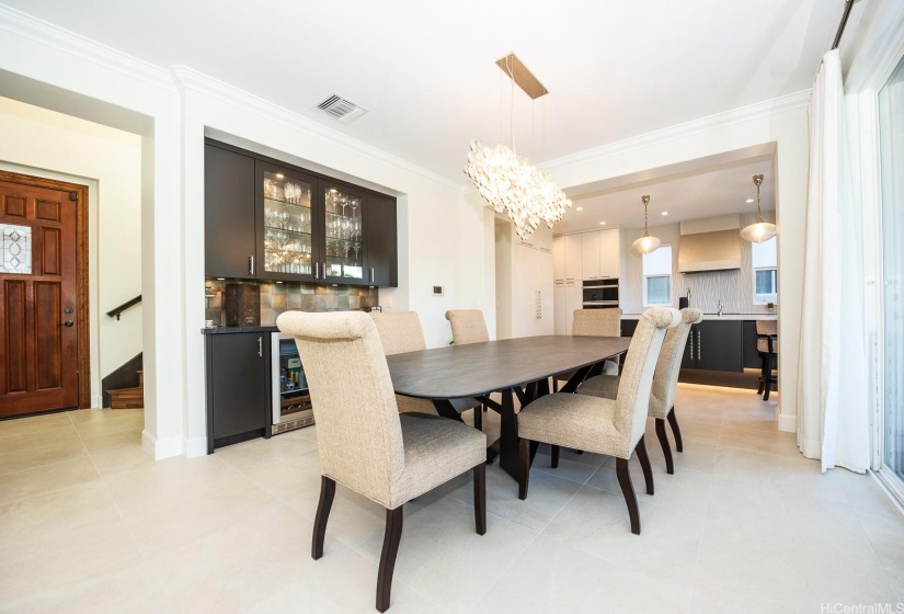 Dining area with brand new beverage center. Complete with side by side beverage/wine reserve.