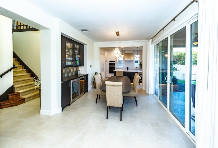 View towards the kitchen. Gorgeous 24x24 Italia tile flooring throughout the first floor.