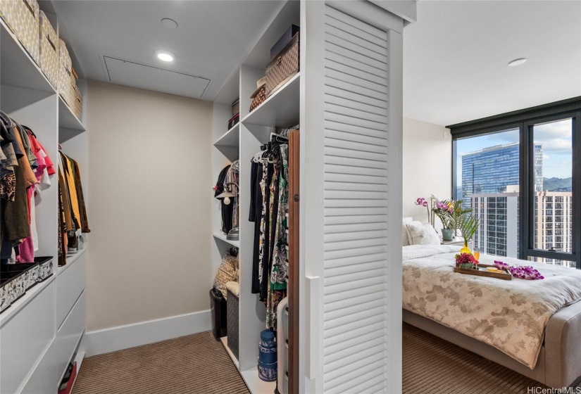 Quality solid wood walk in closet, enough for two!