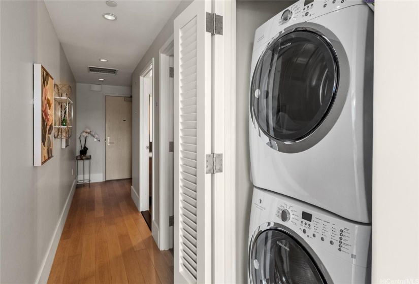 Full sized washer-dryer closet.