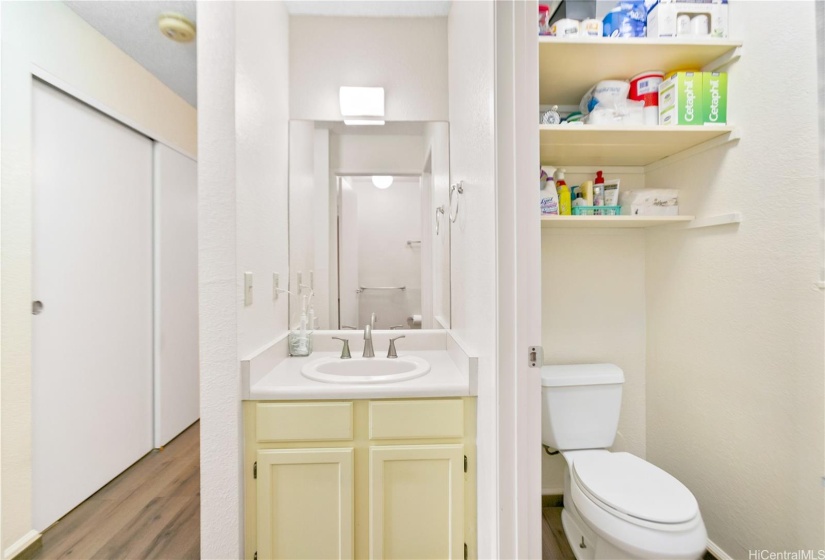 Half bath with added shelves