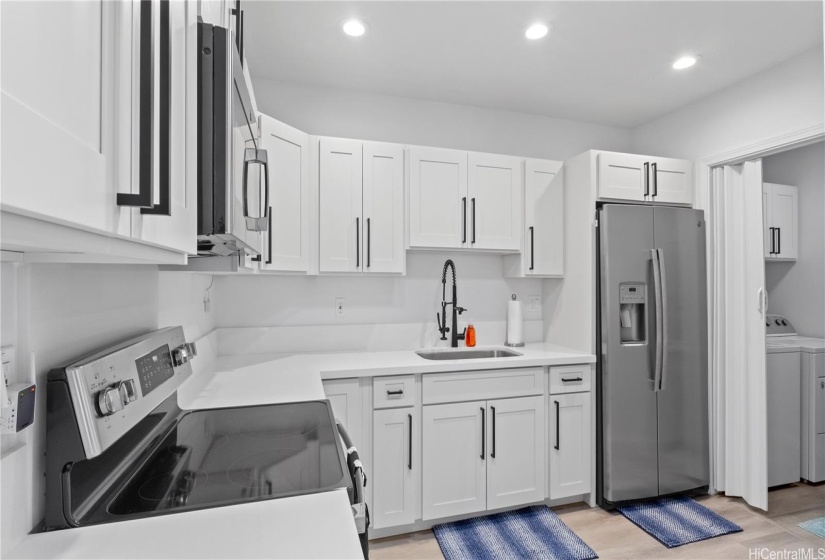 ADU Kitchen with separate laundry room and water heater