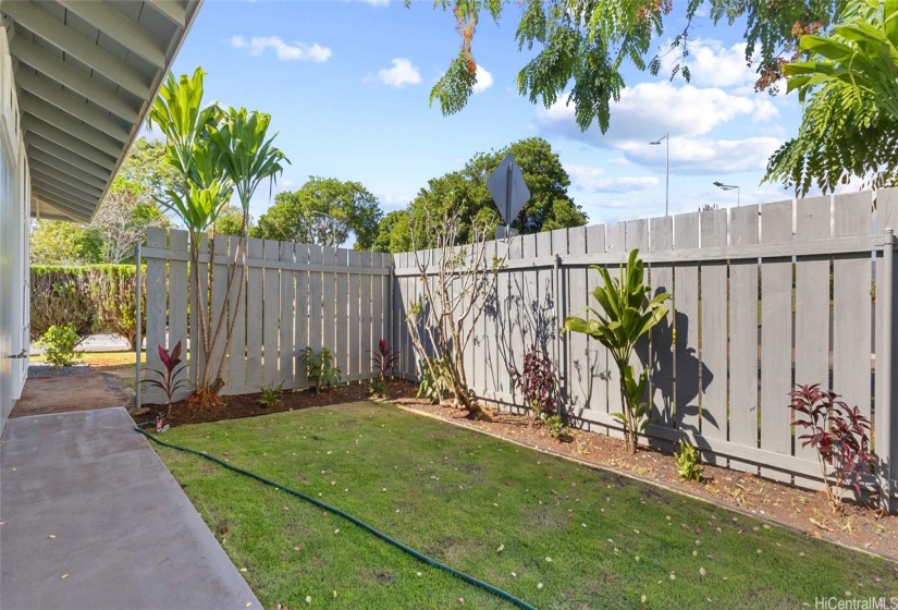 Updated fence and new landscaping.