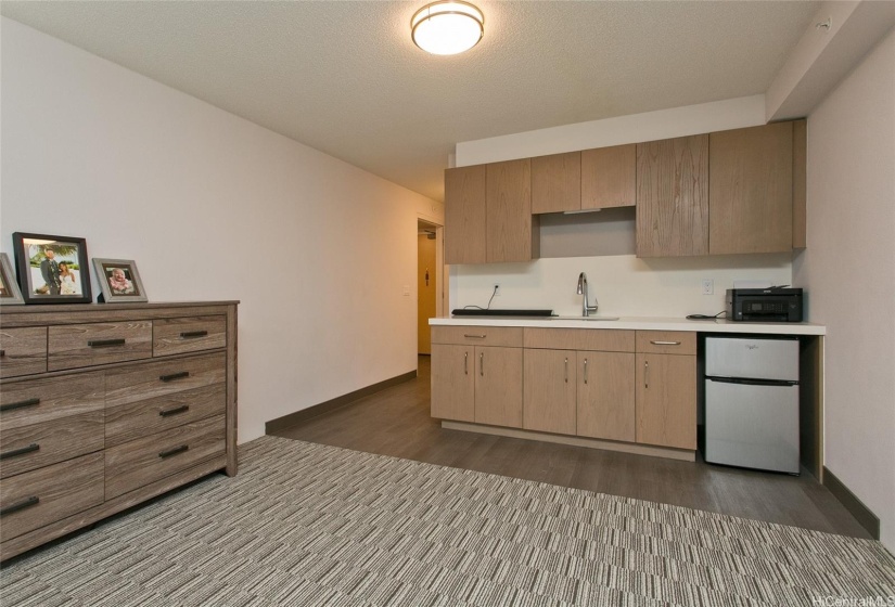 Main bedroom even has a wet bar area and mini refrigerator and feels like a private studio.