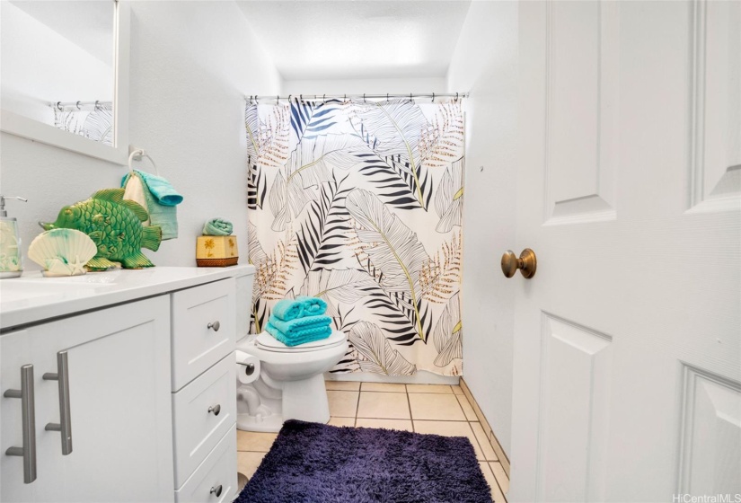 Upstairs bathroom. There is another full bath in the primary room.