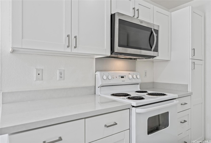 Kitchen is clean and bright.