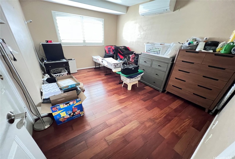 BR #2: Upstairs with engineered hardwood flooring with split AC.